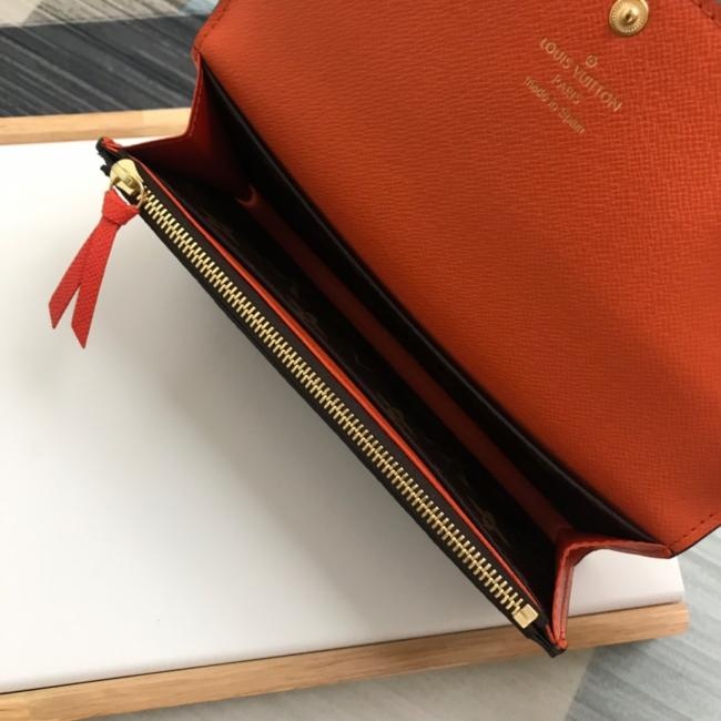 lv M60697 橙色  功能实用且设计华美的 Emilie 钱夹采用柔软的 Monogram 帆布制成 衬以颜色鲜艳的内衬 气质极为优雅 多袋